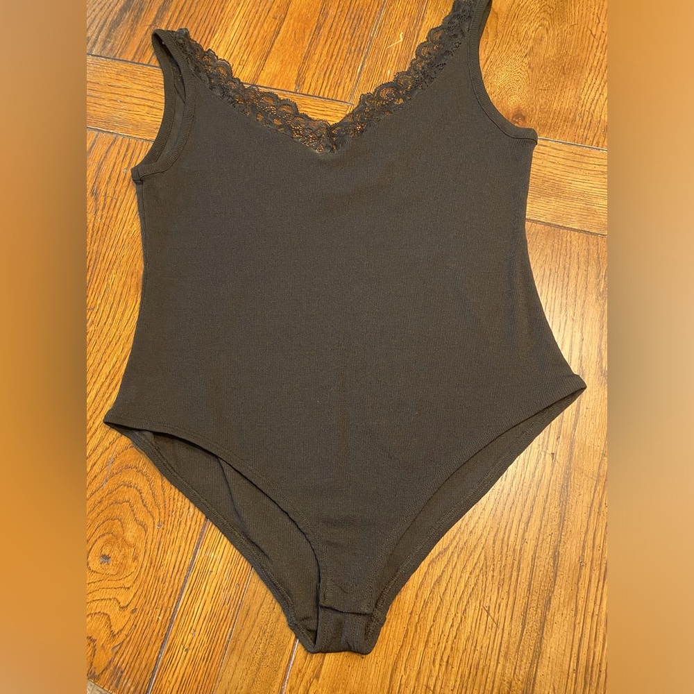Black tank bodysuit.